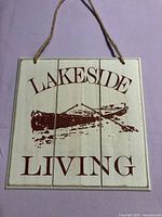 Front view showing design, text and rope hanger