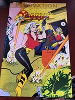 Front cover showing title, publisher Innovation, issue number 1, illustrated female characters