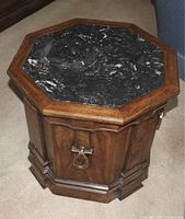Top view showing black marble insert and octagonal wood frame