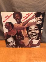 Front jacket showing title and group photographs