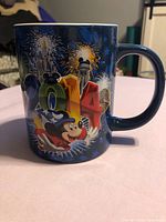 Left side view showing 2014 graphic, Sorcerer Mickey, castle and fireworks