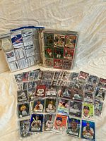 Binder open showing pages of Bowman cards