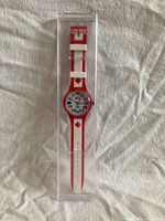 Front view of packaged red and white Canada Swatch watch