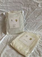 Front view of two packaged Whole Home valances