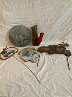 All five garden décor items arranged together for scale and overview