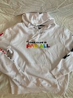 Front view showing rainbow text and overall condition