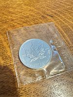 Reverse maple leaf side showing purity 9999 and weight