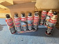 Tray with five FW1 Waterless Detail System aerosol cans plus additional cans