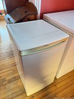 Front view of closed Danby mini fridge