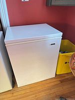 Full view of closed white General chest freezer