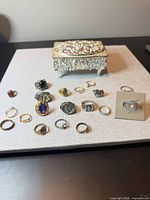 Group shot showing jewelry box and all rings