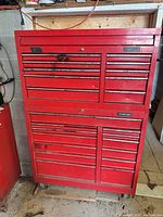 Front view of red Husky rolling tool cabinet showing all drawers