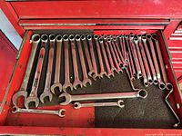 Drawer with full assortment of combination and box wrenches