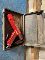 Timing light in open carrying case