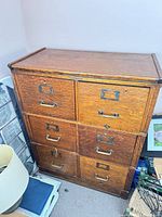 Front view of oak six-drawer stacking filing cabinet