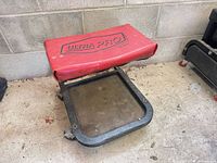 Overall stool showing seat, frame, tray and casters