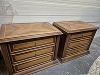 Front view of both nightstands showing drawers and veneer finish