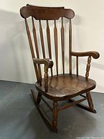 Front view of wooden rocking chair