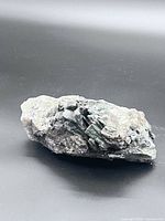 Full view of the smoky quartz specimen on black background