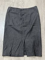 Full view of skirt front showing color, slit, and length