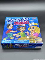 Front of Hedbanz Charades box