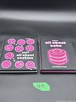 Front covers of both hardcover cookbooks