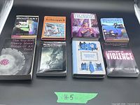 all eight books front covers