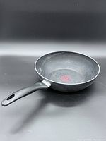 Top angled view showing interior, handle, Thermo-Spot