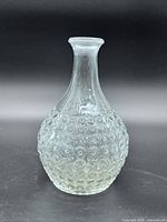 Front view of clear bubble glass vase showing full shape