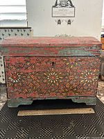 Front view showing geometric paint, overall form, keyhole and scale ruler