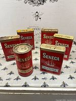 Group shot of all six Seneca spice tins