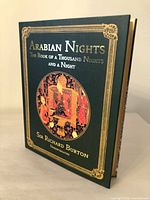 Front cover of Arabian Nights hardcover showing title and decoration