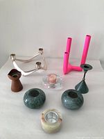 Group shot of all eight candleholders