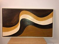 Front view of framed abstract painting