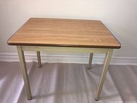 Full view of table front and side showing overall design