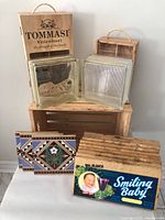 Group shot showing all items: glass bricks, tiles, crate ends, wine boxes, crate