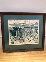 Full view of framed linocut print with mat and frame