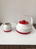 Teapot and creamer front view