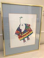 Full view of framed print showing artwork and frame