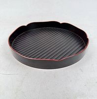 Top view showing ribbed interior and scalloped rim