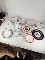 Overview of all porcelain items laid out on table