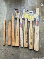 All eight hickory handles laid out