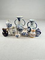 Group shot of all nine blue and white porcelain items
