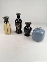 Group shot of all four vases