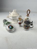 Group shot showing all five porcelain miniatures