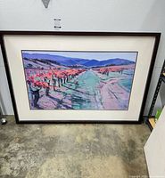 Front view of framed vineyard artwork leaning against wall
