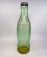 Full view of Coca-Cola bottle bank front