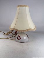 Full view of lamp with shade and cord visible