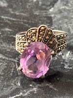 Front view of ring showing amethyst and marcasite fan design