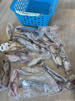 Group of sealed reading glasses spread on table